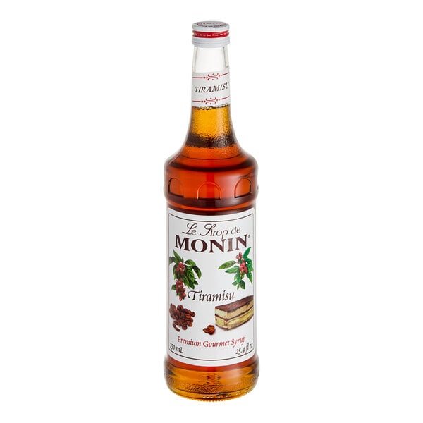 A bottle of Monin Tiramisu flavoring syrup with a white label.