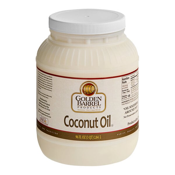 A white plastic Golden Barrel container of coconut oil with a white label.