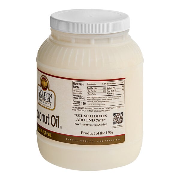 A Golden Barrel white container of coconut oil with a label.