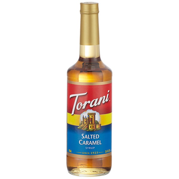 A Torani Salted Caramel flavoring syrup glass bottle with a label.