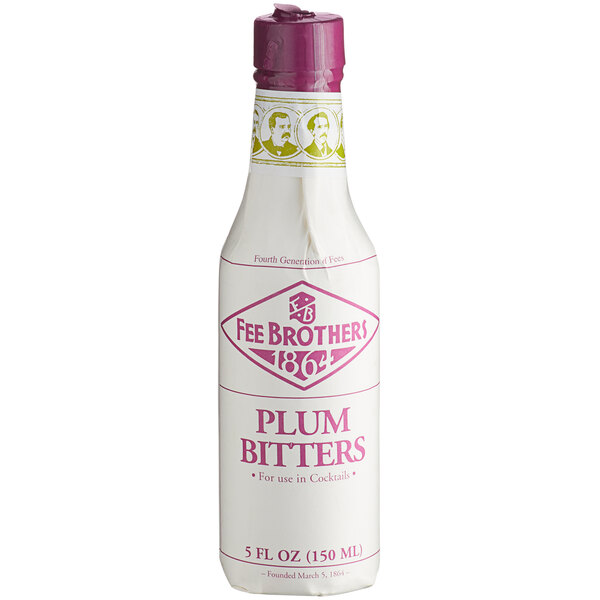 A bottle of Fee Brothers Plum Bitters with a purple cap.