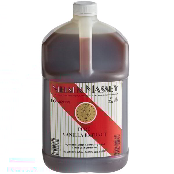 A gallon of Nielsen-Massey Pure Vanilla Extract with a red label and logo.