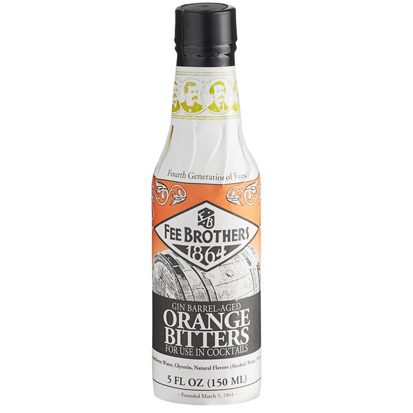 A bottle of Fee Brothers Gin Barrel Aged Orange Bitters with a label.