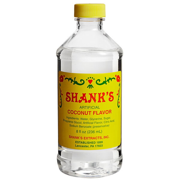 A case of 12 Shank's Imitation Coconut Flavor bottles on a counter.