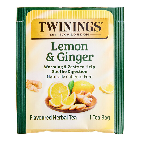 A case of Twinings Lemon & Ginger Herbal Tea Bags with a green and white package.
