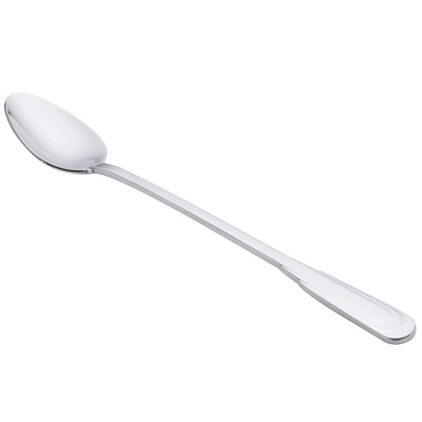 A silver spoon with a white handle.