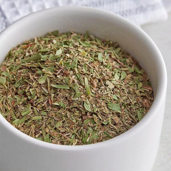 A white bowl of Regal Herbs de Provence seasoning.