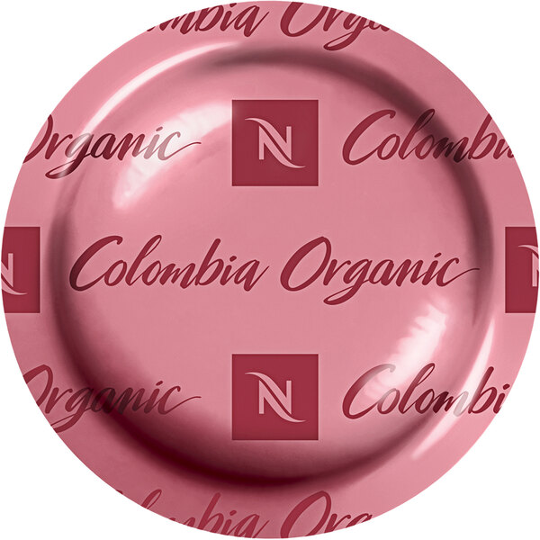 A case of Nespresso Professional Colombia Organic Single Serve Coffee Capsules on a counter.