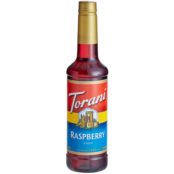 A Torani plastic bottle of raspberry syrup with a label.