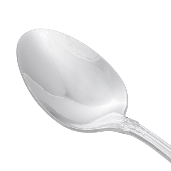 A Oneida Rosewood stainless steel teaspoon with a silver handle.