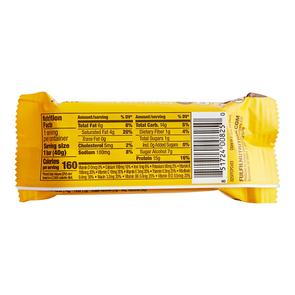 A yellow FULFIL chocolate peanut caramel protein bar with black text on the label.