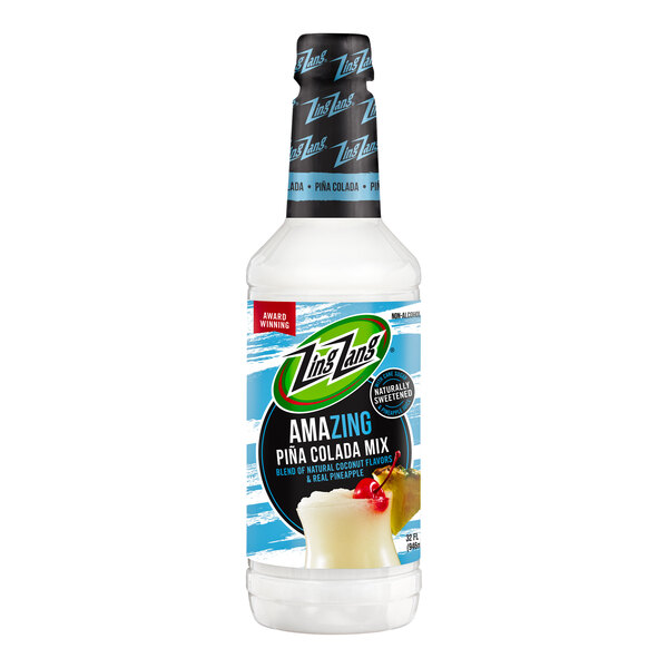 A bottle of Zing Zang Pina Colada Mix with a white label and white liquid.