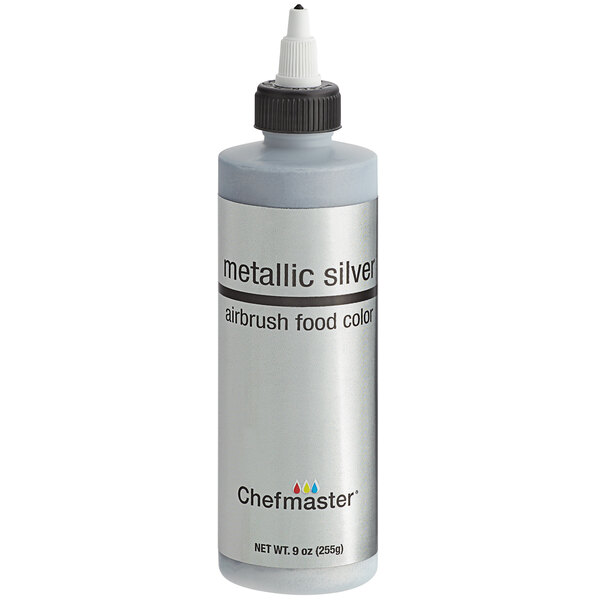 A close up of a silver Chefmaster airbrush color bottle with a black cap.