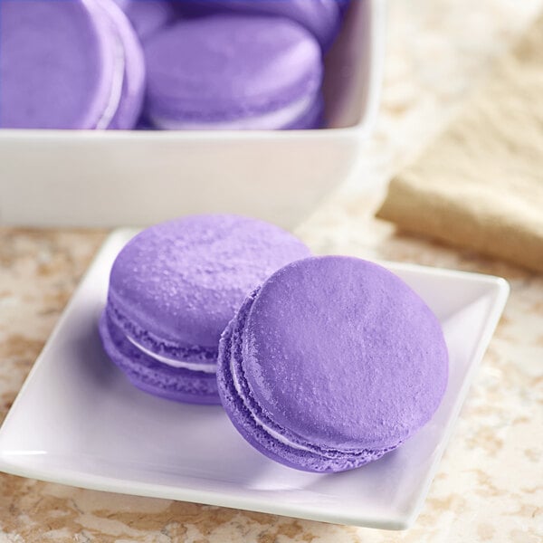 A plate of purple macaroons with Chefmaster Natural Violet food coloring.