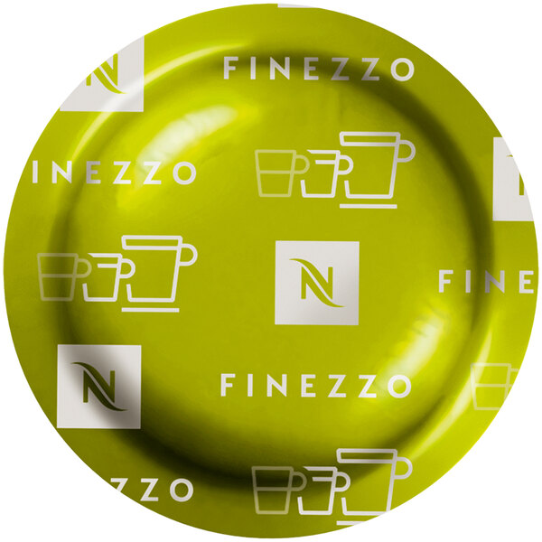 A green and white Nespresso Finezzo logo on a sign.