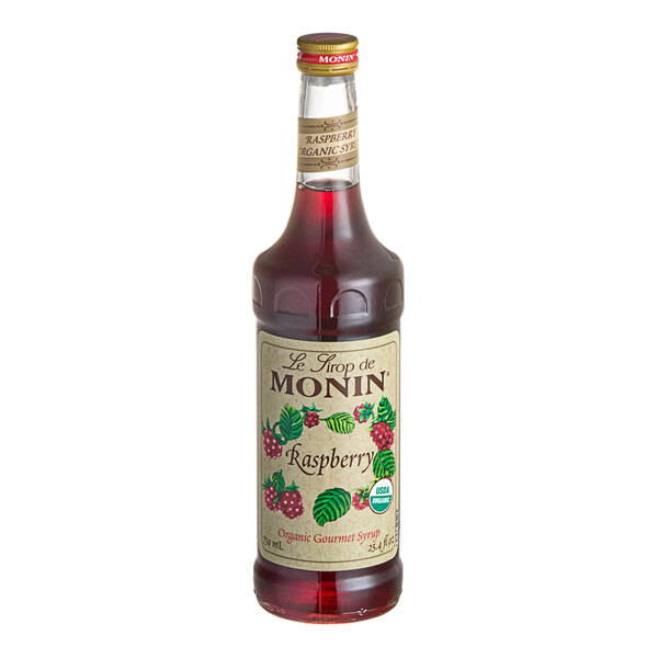A bottle of Monin Organic Raspberry Flavoring Syrup, 750 mL.