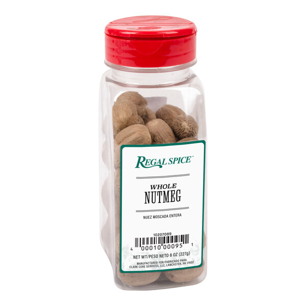 A jar of brown Regal whole nutmeg with a red lid.