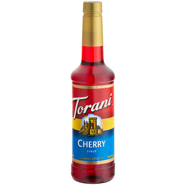 A Torani plastic bottle of cherry syrup with a label.