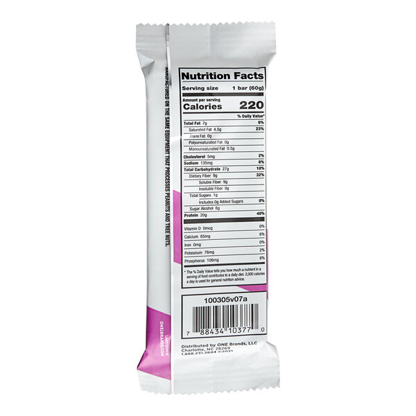 A ONE fruity cereal protein bar in white packaging with a purple label.