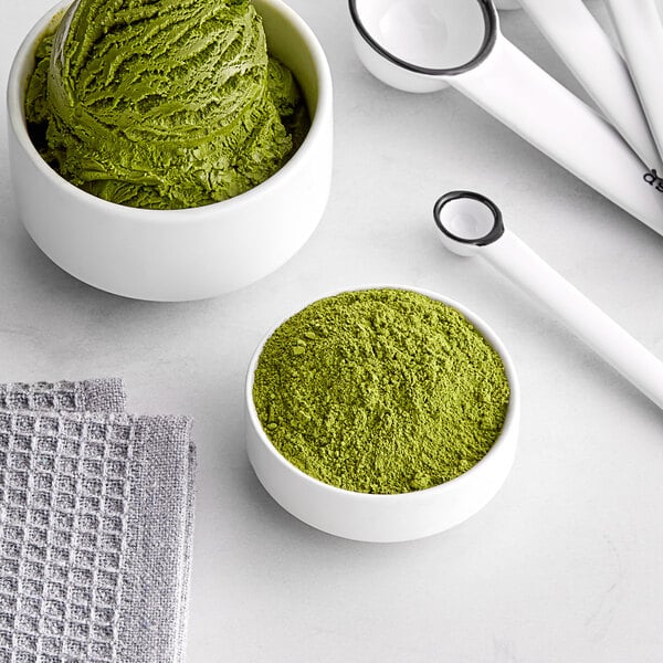 A white bowl of green Jade Leaf Organic Culinary Matcha Powder.