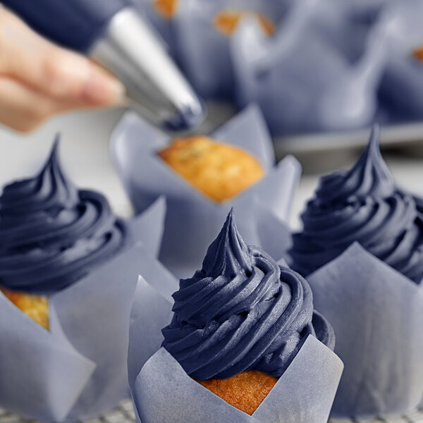 Navy blue frosted cupcakes decorated with Chefmaster Liqua-Gel food coloring.