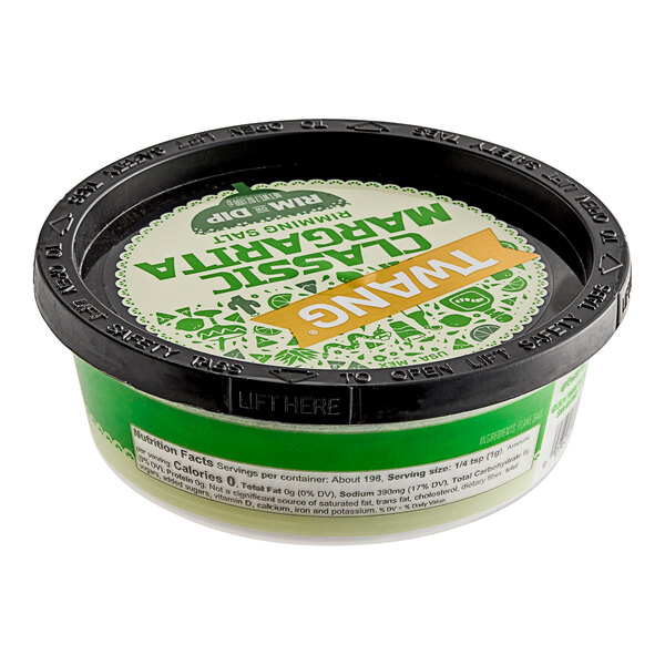 A Twang Classic Rimming Salt container on a table with a lid.