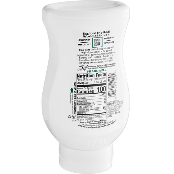 A white plastic container of Real Pineapple Puree Infused Syrup with black and green text.