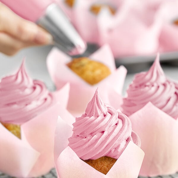 Pink cupcakes with Chefmaster Bakers Rose Liqua-Gel food coloring on the frosting.