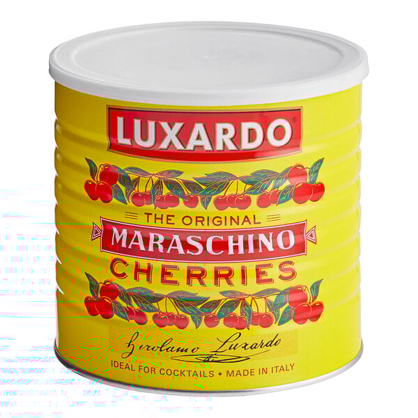 A yellow Luxardo can of maraschino cherries with red and white text.
