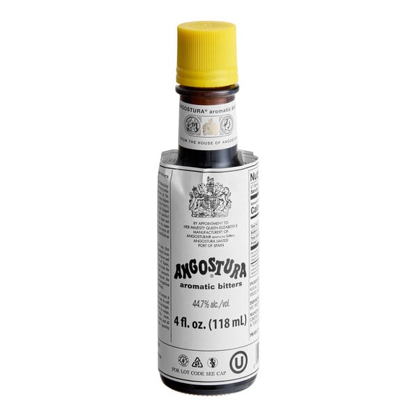 A 4 fl. oz. bottle of Angostura aromatic bitters with a yellow cap.