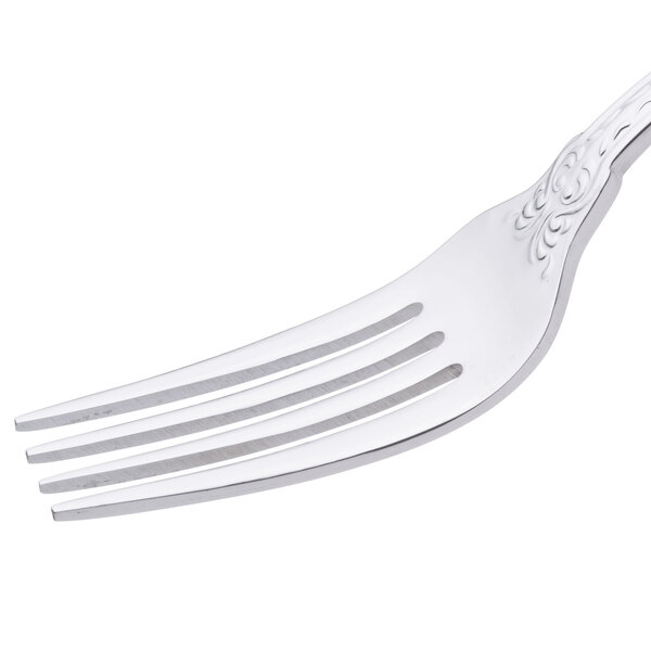 A Oneida Rosewood stainless steel fork with a design on the handle.