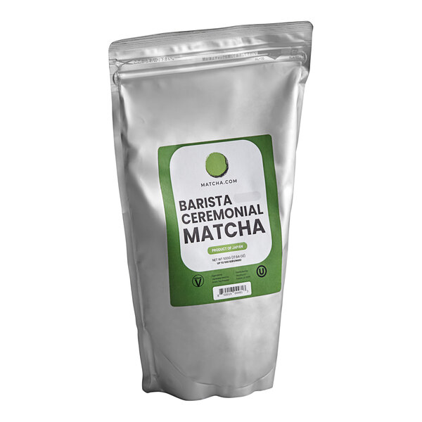 A white bag of Matcha.com Ceremonial Barista Matcha Powder with a green label.