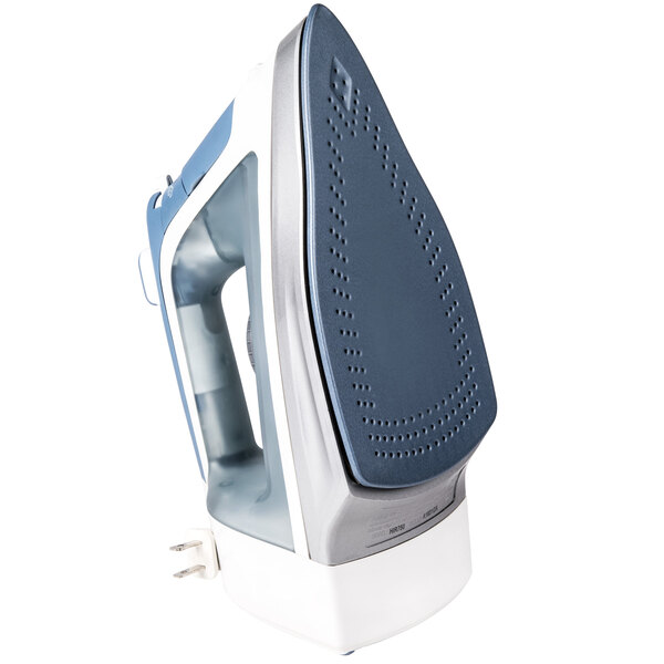 A close-up of a Hamilton Beach steam iron with a retractable cord.