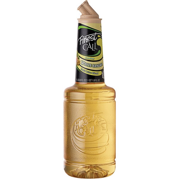 A yellow labeled bottle of Finest Call Premium White Sangria Mix.