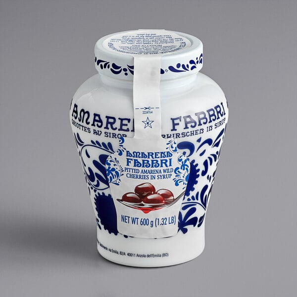 A white jar of Fabbri Amarena Cherries with a blue and white label.