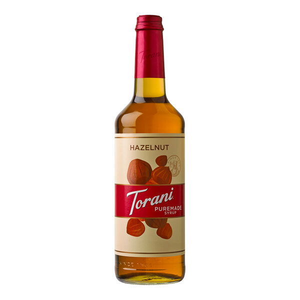 A close up of a Torani Puremade Hazelnut flavoring syrup bottle label.