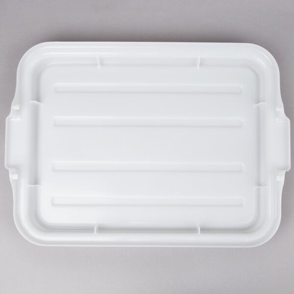 A white Vollrath plastic food storage box lid with a handle.