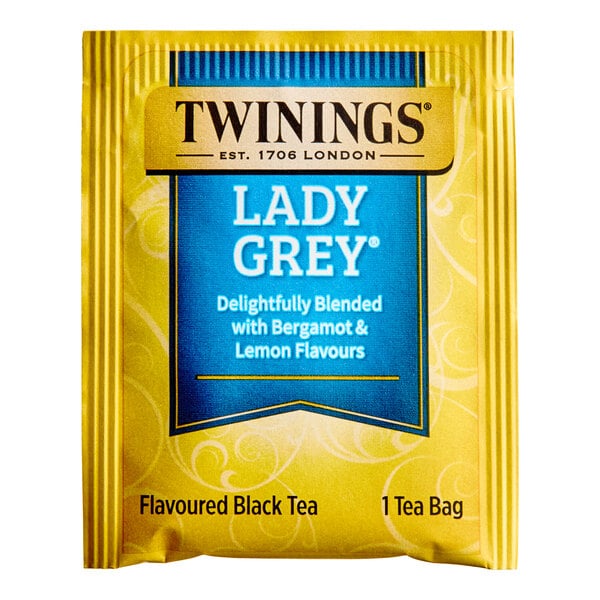 A yellow and blue box of Twinings Lady Grey Tea Bags.