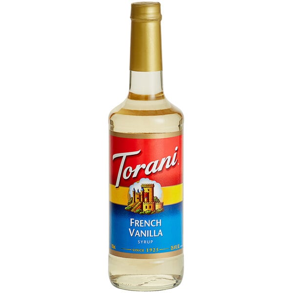 A Torani French Vanilla flavoring syrup bottle with a red label.