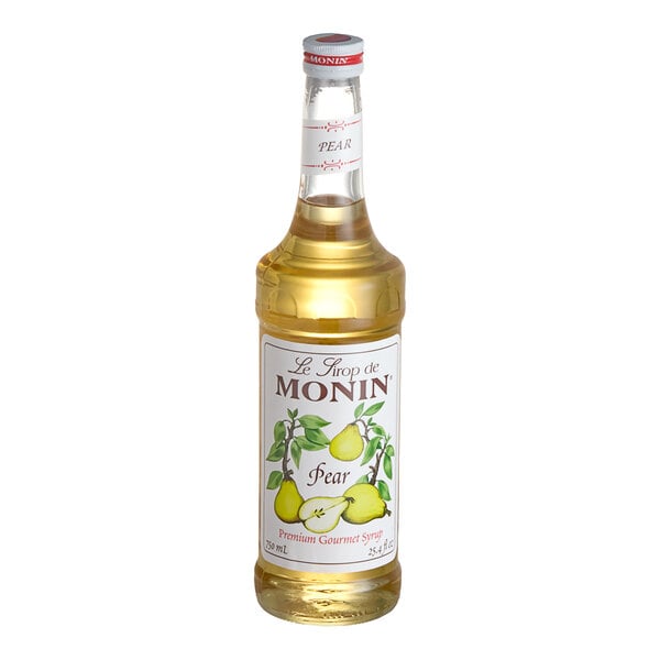 A bottle of Monin pear flavoring syrup with a white label.