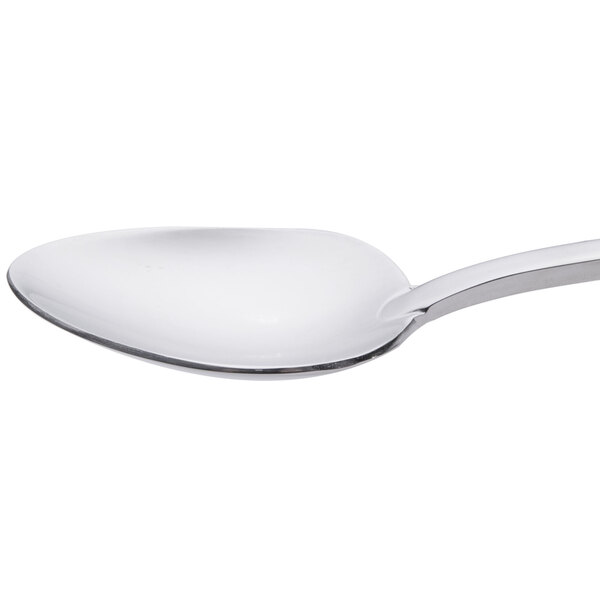 A Oneida stainless steel teaspoon with a white handle.