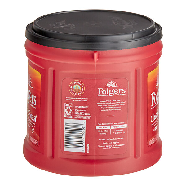 A red Folgers container of ground coffee with a black lid.