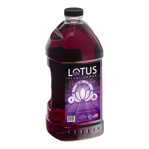 A large clear plastic bottle filled with a dark purple liquid and labeled 'Lotus Plant Power Purple Lotus' with a lotus flower graphic on the front.