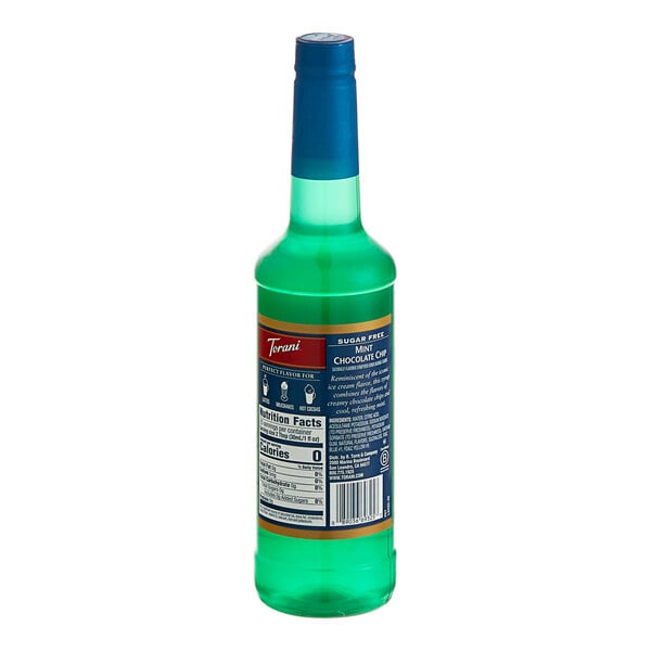 A green Torani Sugar-Free Mint Chocolate Chip flavoring syrup bottle with a green lid.