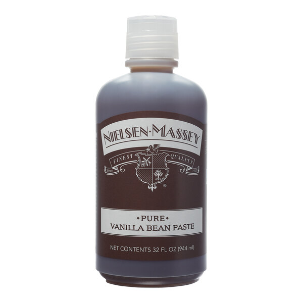 A close-up of a Nielsen-Massey Pure Vanilla Paste bottle with a label.