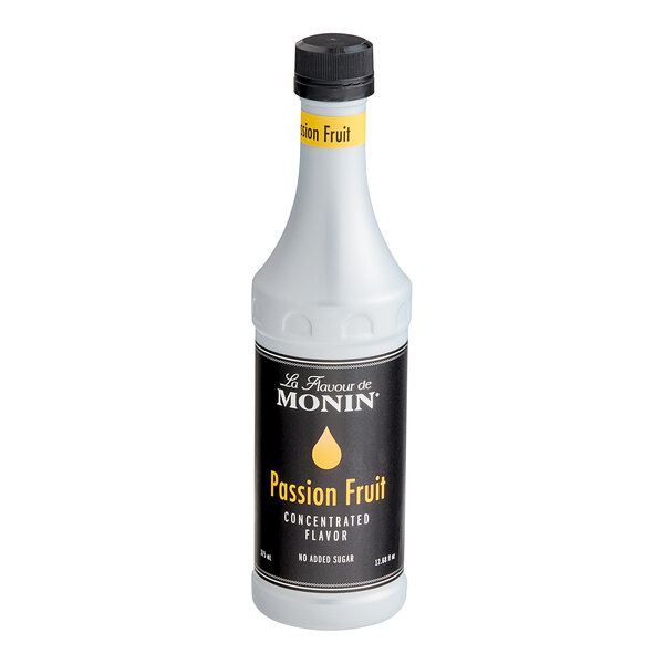 A bottle of Monin Passion Fruit Concentrated Flavor.