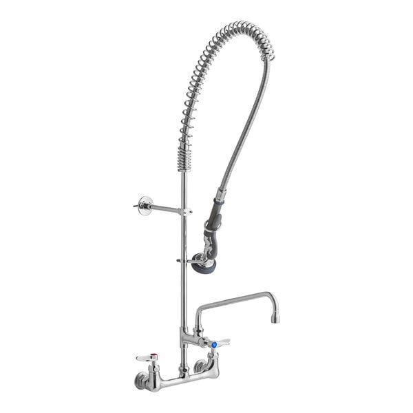 A T&S wall mounted pre-rinse faucet with a hose and hand held sprayer.
