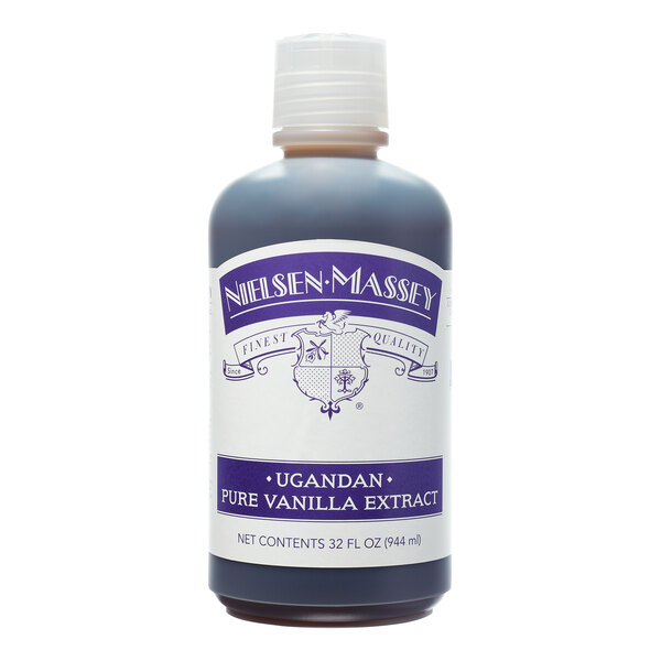 A Nielsen-Massey Ugandan Vanilla Extract bottle on a counter.