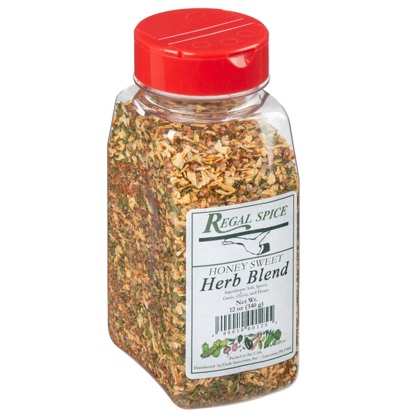 A case of 12 jars of Regal Honey Sweet Herb Blend with a label.