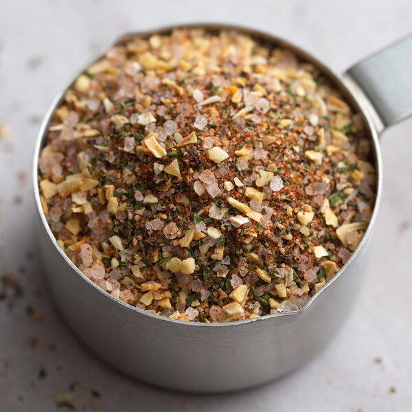 A metal bowl filled with Regal Honey Sweet Herb Blend.